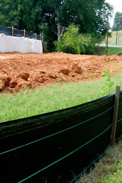 Erosion control silt fence at a construction site used to manage stormwater run

