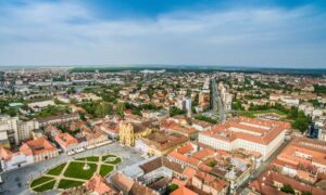 Stormwater design urban campus build - ALTA SURVEY Dallas Aerial view of a dense urban district showing rooftops, streets, and public spaces where stormwater design plays a critical role
