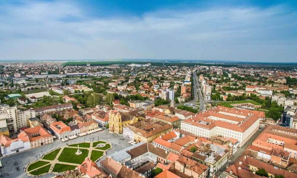  Aerial view of a dense urban district showing rooftops, streets, and public spaces where stormwater design plays a critical role
